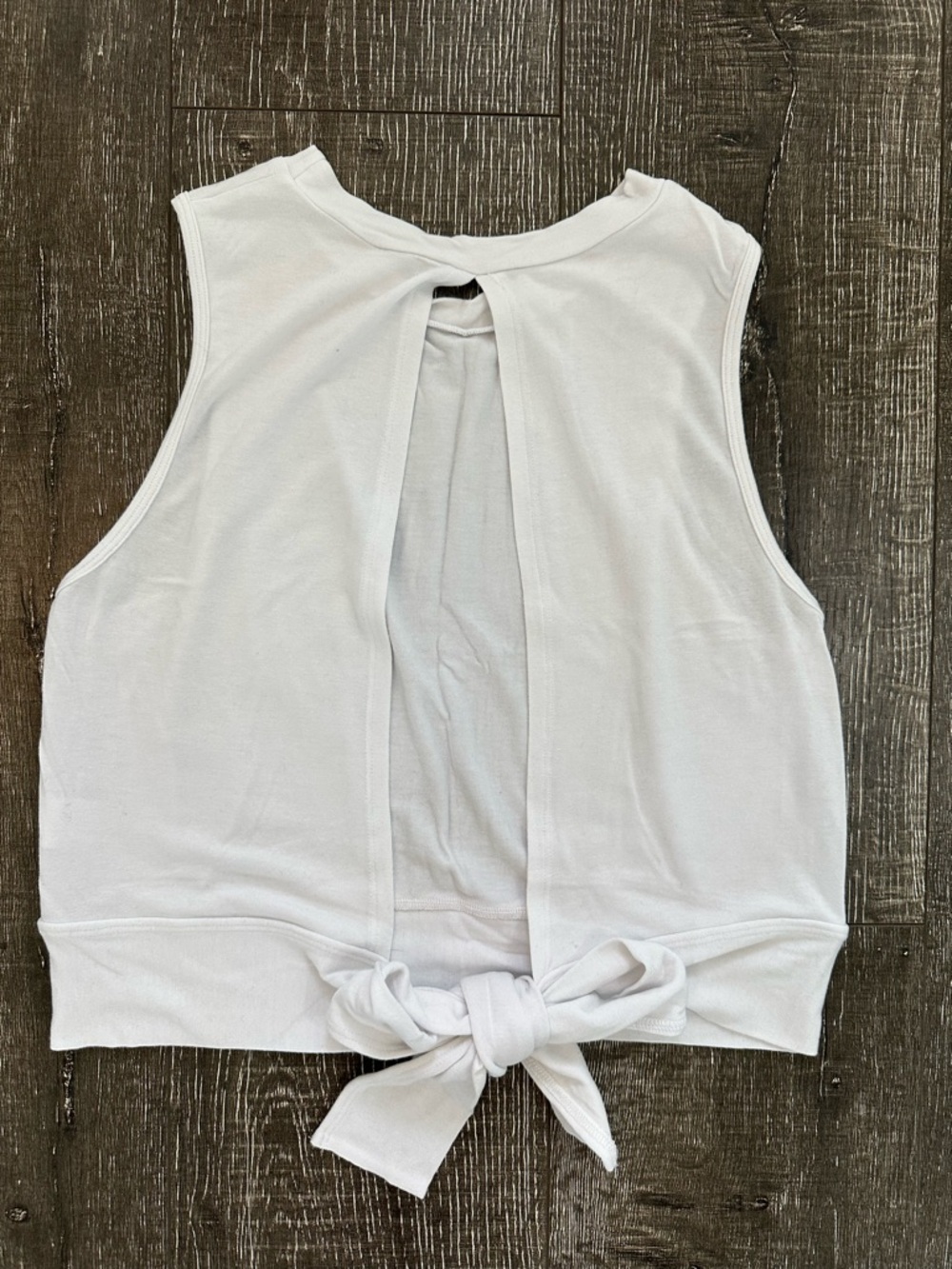 Strut This Women’s Open Back Tie Tank in White - Size XS